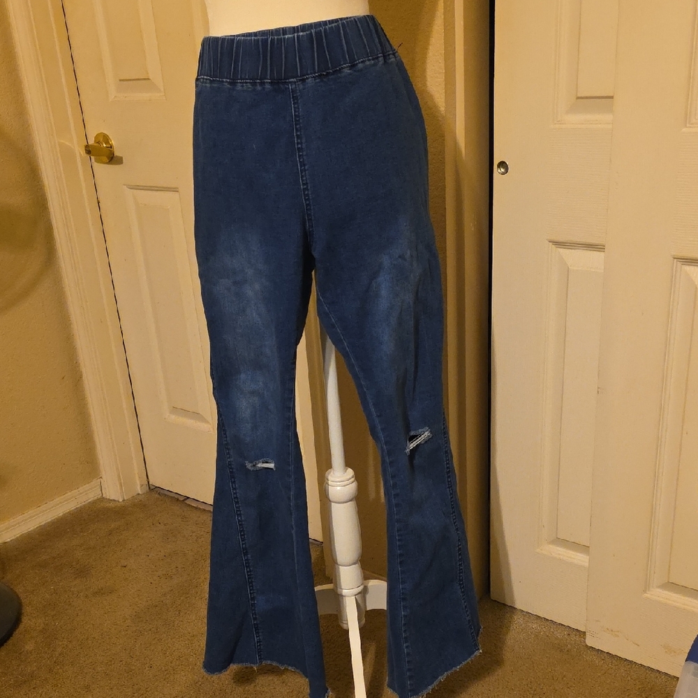 Blue Flared Denim Pants. Distressed. Elastic Waist. Back Pockets